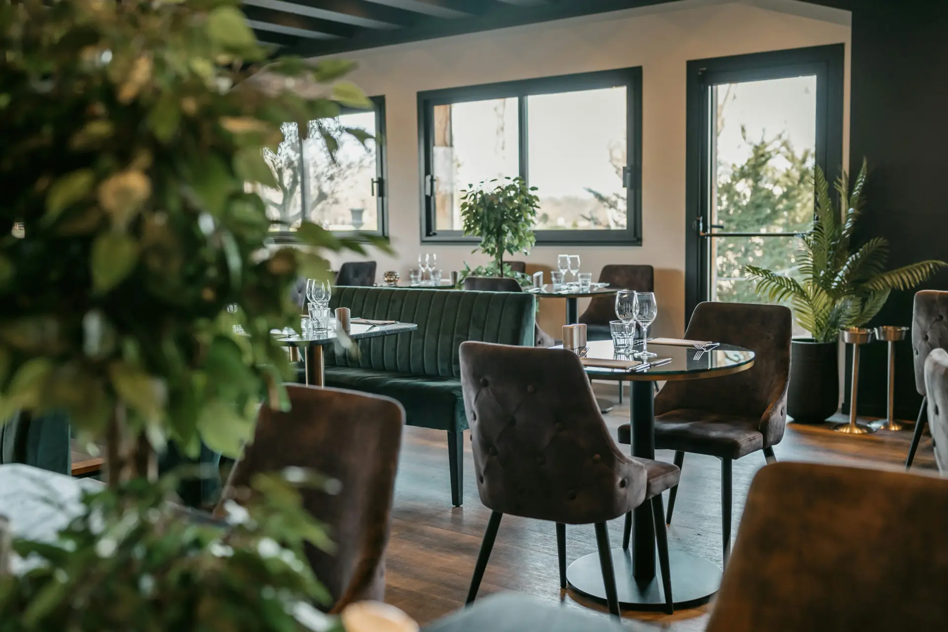 Cozy date night restaurant interior with velvet seating