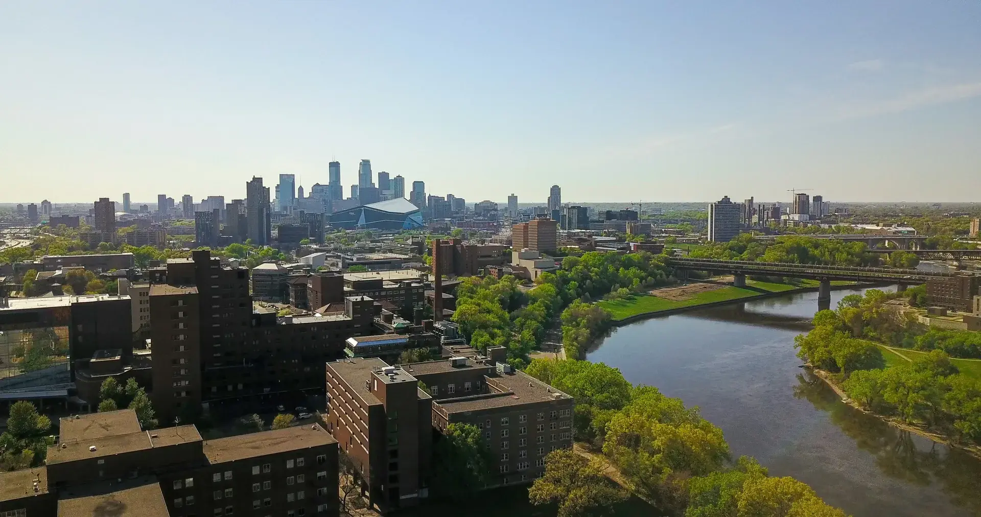 Aerial view of the Minneapolis skyline and river in summer