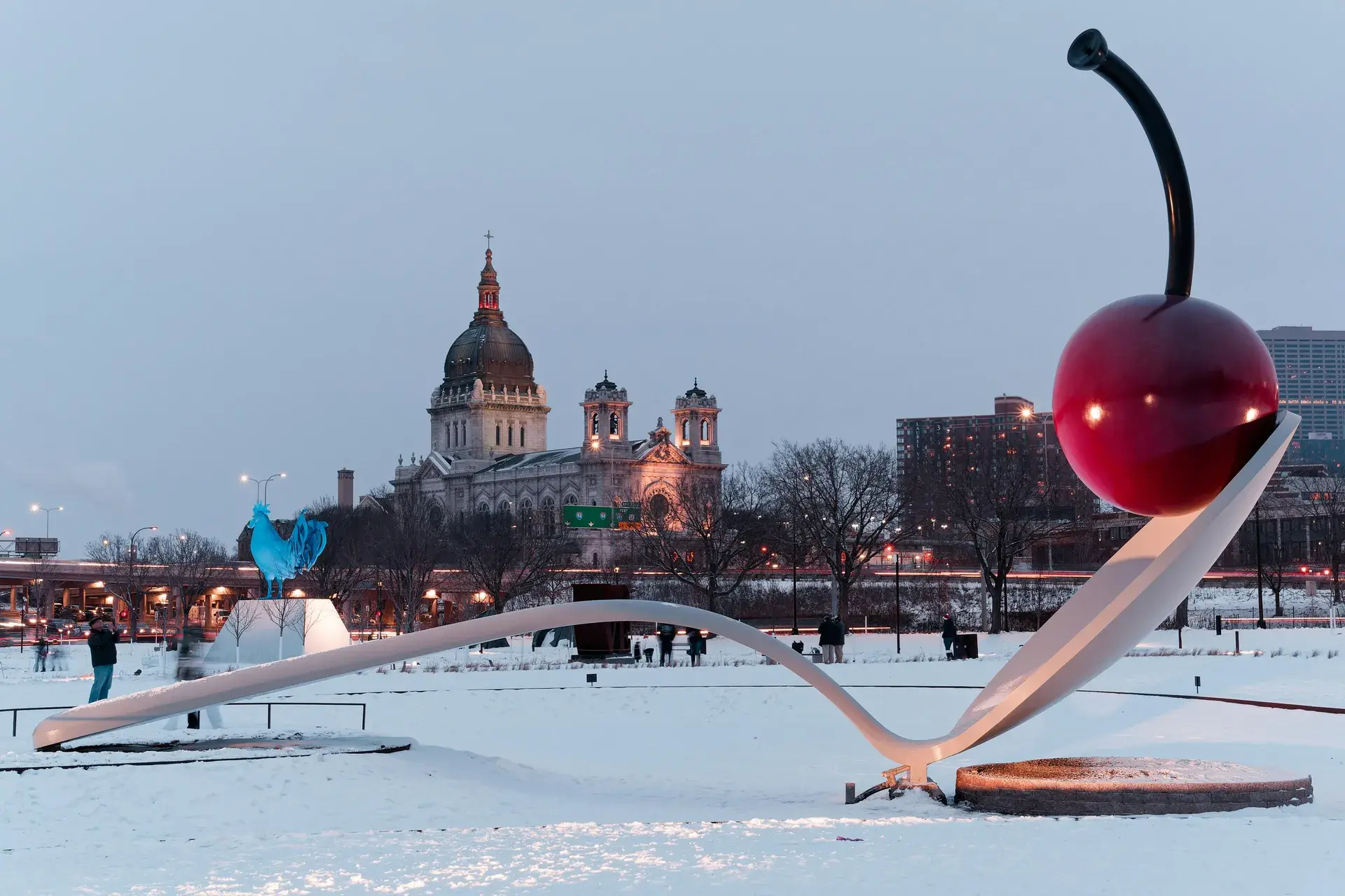 Bryn Mawr neighborhood street with trees and the Minneapolis skyline in the distance