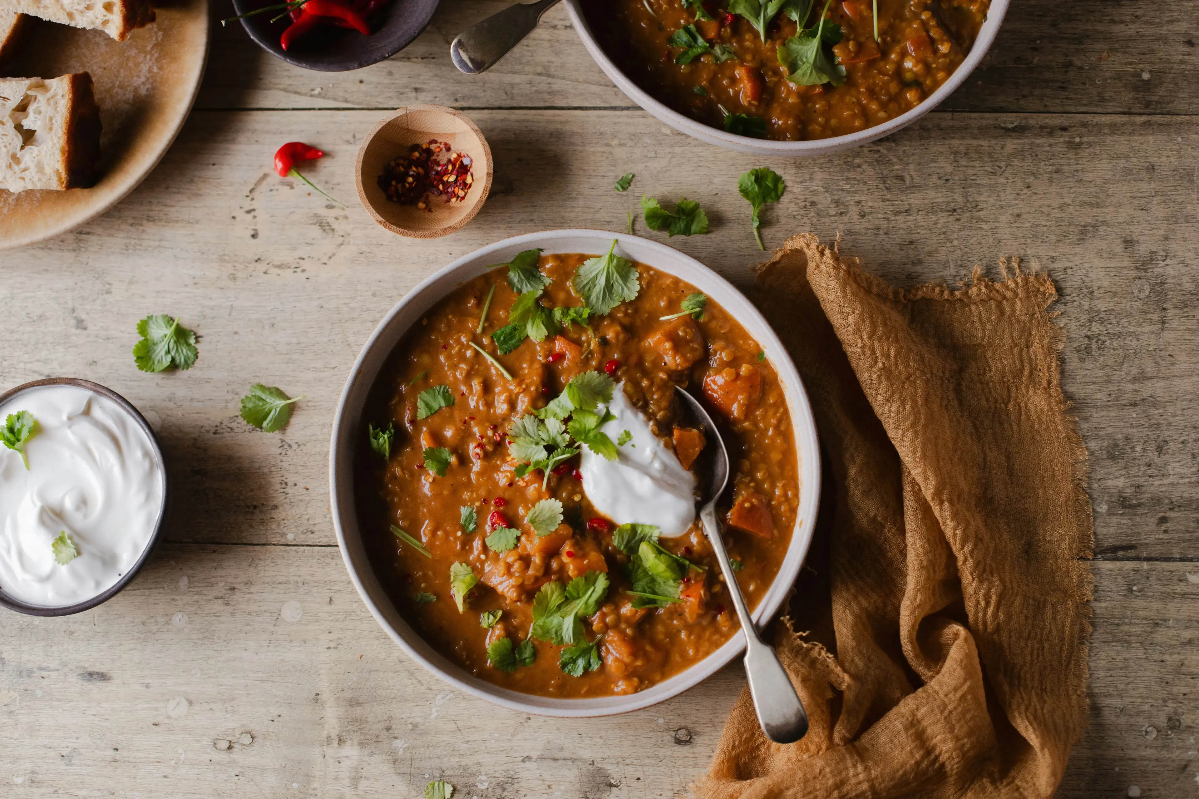 Ethiopian lentil stew with yogurt and bread