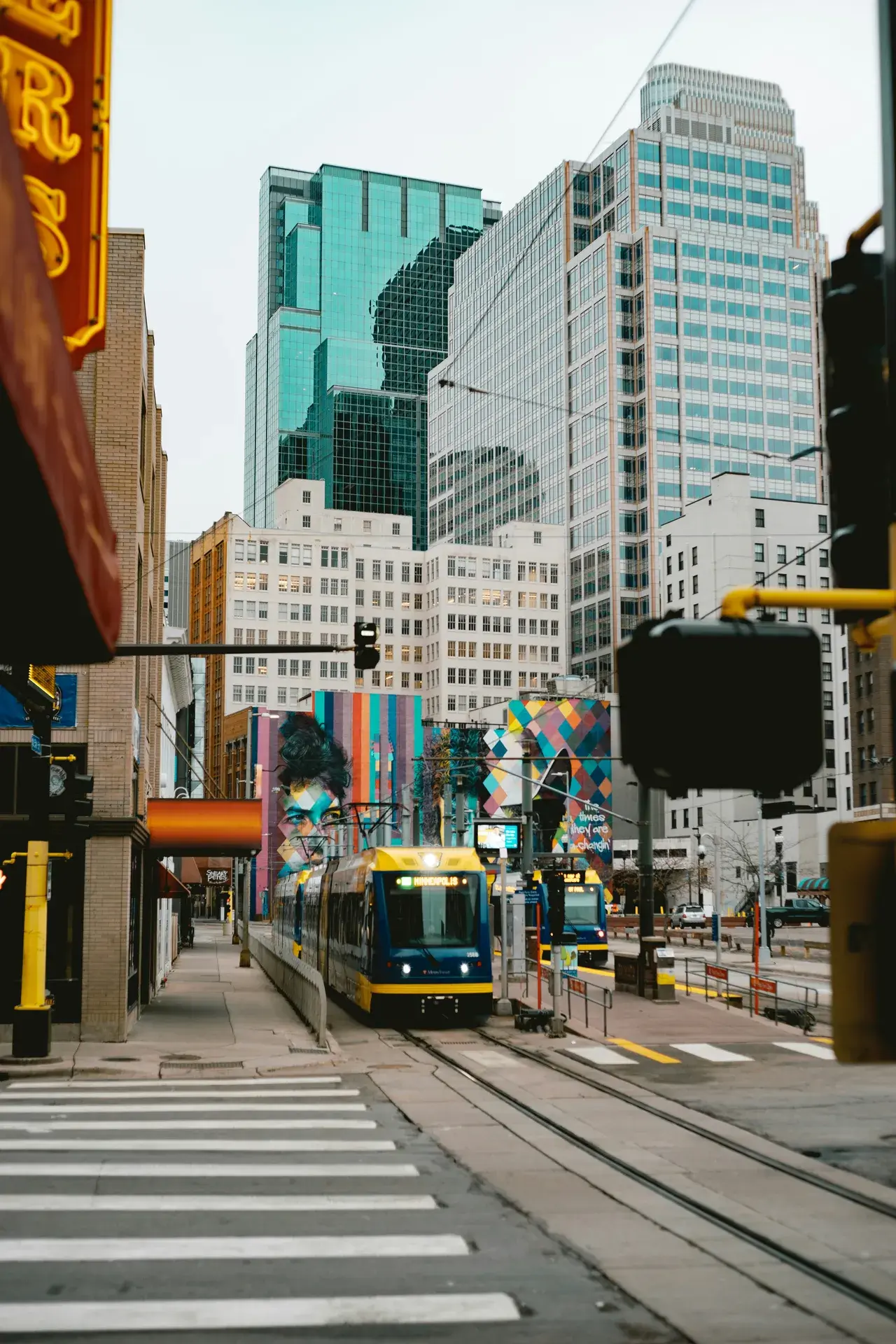 Cedar Avenue in the Cedar-Riverside neighborhood of Minneapolis, with Riverside Plaza towers visible in the background