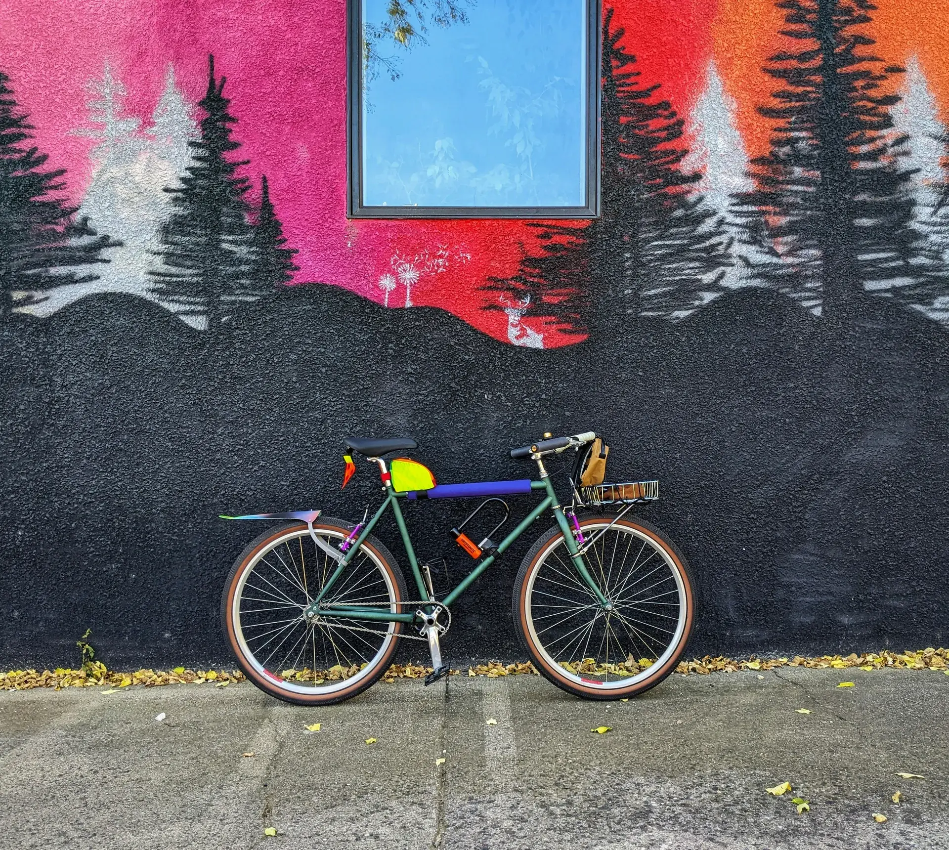 Franklin Avenue in the Seward neighborhood of Minneapolis on a fall afternoon, trees in color, cyclists and pedestrians